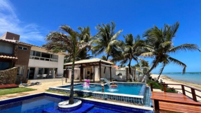 Casa pé na areia com piscina na Barra de São Miguel